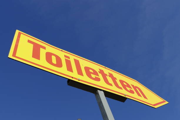 istock Toilet sign, signpost, arrow 1063827258