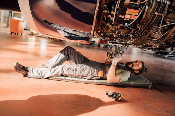 istock Young man repairing aircraft 1063828610