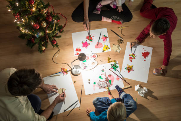 istock Family making Christmas decorations 1063829732