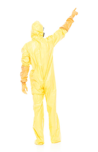 istock Man in protective clothing and pointing up 1063830886