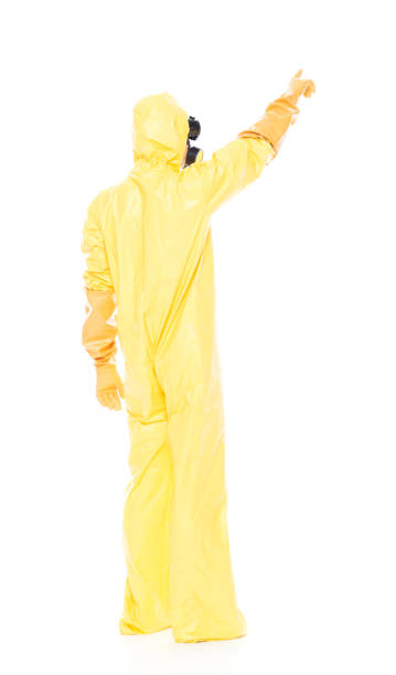 istock Man in protective clothing and pointing up 1063831418