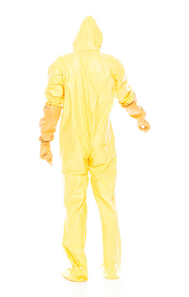 istock Man in protective clothing and pointing down 1063831472