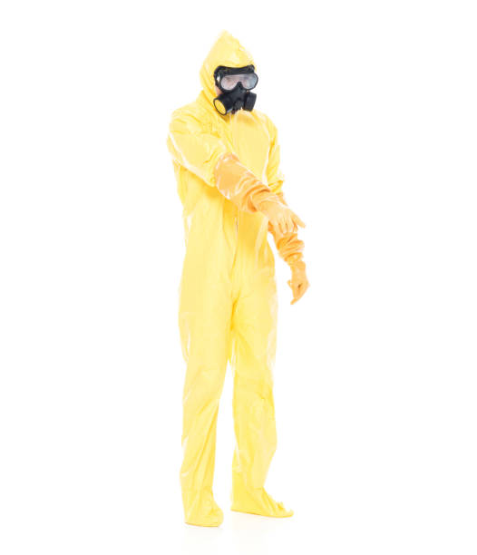 istock Man in protective clothing and pointing down 1063831512