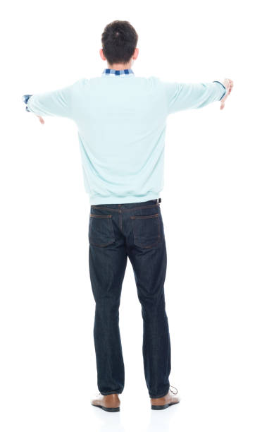 istock Handsome young man showing two thumbs doown 1063831810