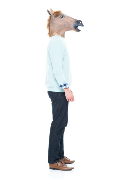 istock Man with horse mask standing with hands by his side 1063831954