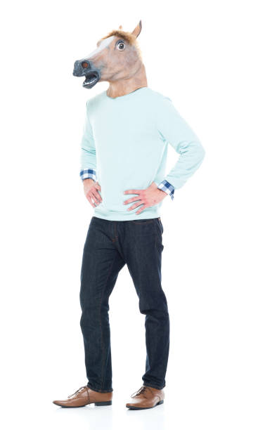 istock Man with horse mask standing with hands on hips 1063831984