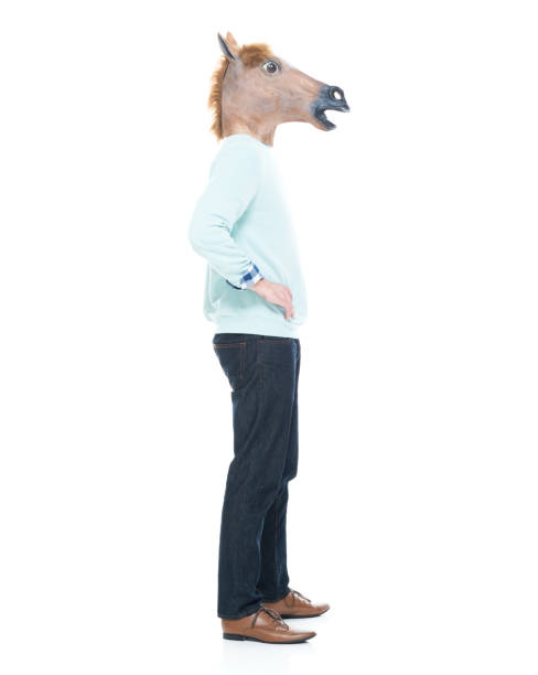 istock Man with horse mask standing with hands on hips 1063832038