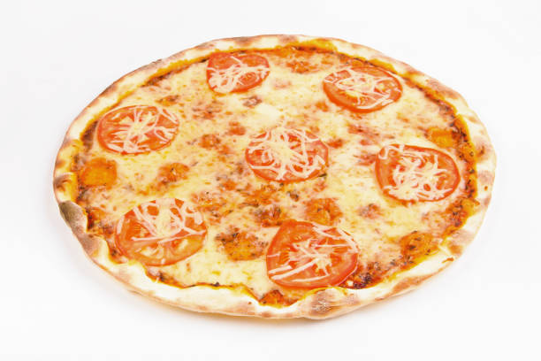 istock Pizza with cheese and tomatoes on a white 1063835300