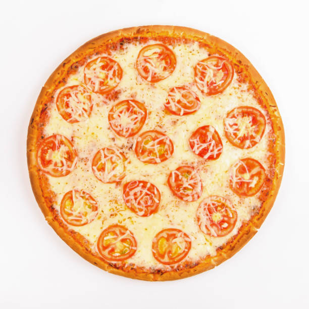 istock Pizza with cheese and tomato slices on a white 1063835502
