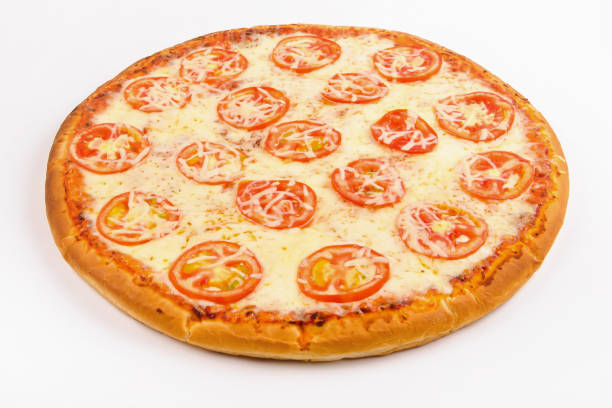istock Pizza with cheese and tomato slices on a white 1063835542