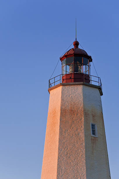 Sandy Hook Lighthouse at Sunset stock photo