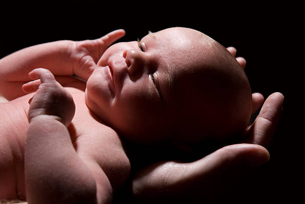 istock baby in dad's arms 106383868