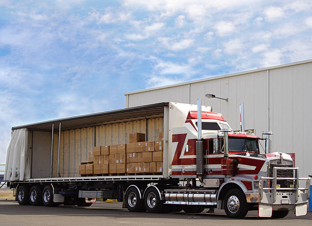 istock Red and white truck with blue sky 106384002