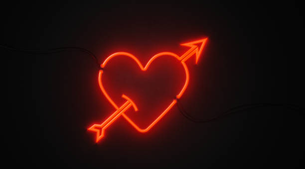 сердце и стрела формы красный неоновый свет на черной стене - день святого валентина и амур концепции - cupid стоковые фото и изображения