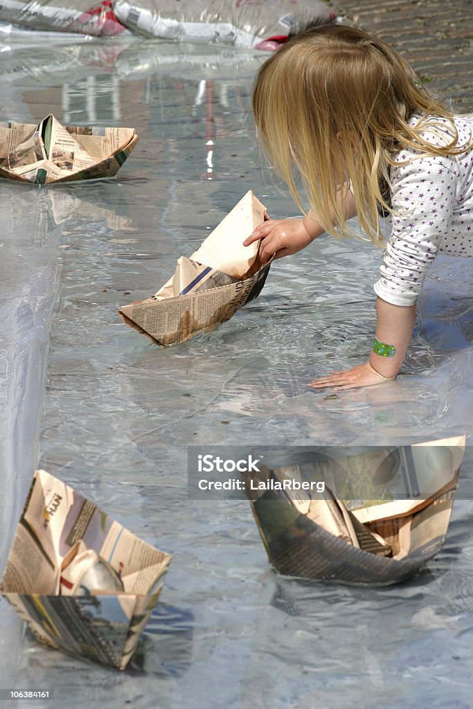 Girl and paperboats  Nautical Vessel Stock Photo