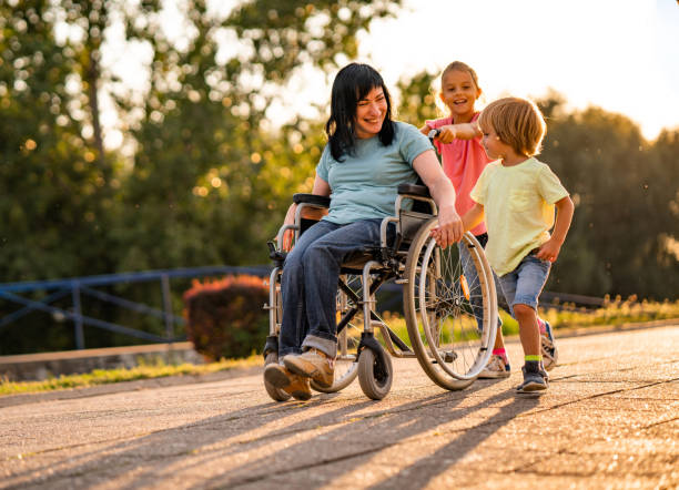 istock Happy kids with disability women 1063844004
