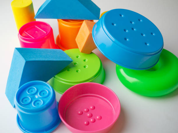 istock colored educational toys for babies, cubes, pyramids, cones, rings 1063849368