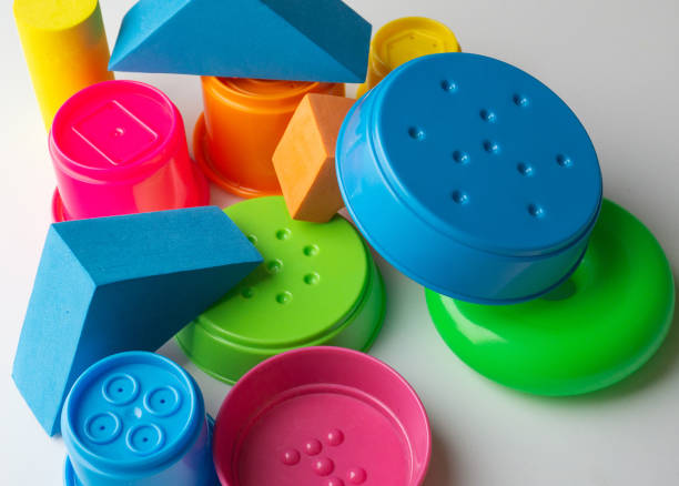 istock colored educational toys for babies, cubes, pyramids, cones, rings 1063849380