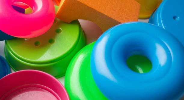 istock colored educational toys for babies, cubes, pyramids, cones, rings 1063850408