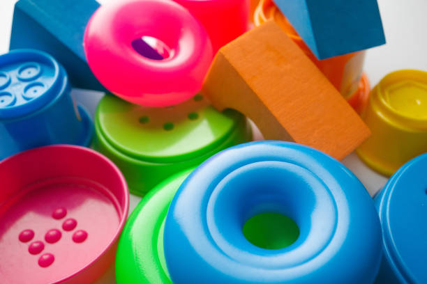 istock colored educational toys for babies, cubes, pyramids, cones, rings 1063850460