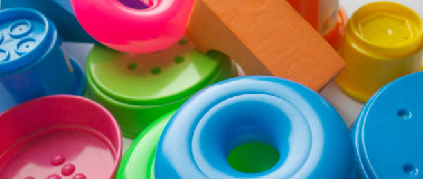 istock colored educational toys for babies, cubes, pyramids, cones, rings 1063850468
