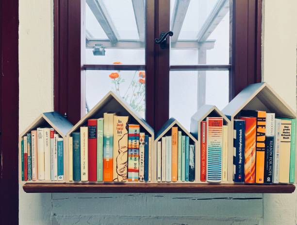 istock Little library on the window sill 1063850500