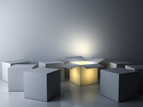 Stand out from the crowd Different creative idea concepts One luminous opened box glowing among others closed white square boxes on dark white room background with reflections and shadows 3D rendering