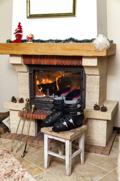 istock Boots ski boots in front of fireplace 1063855360