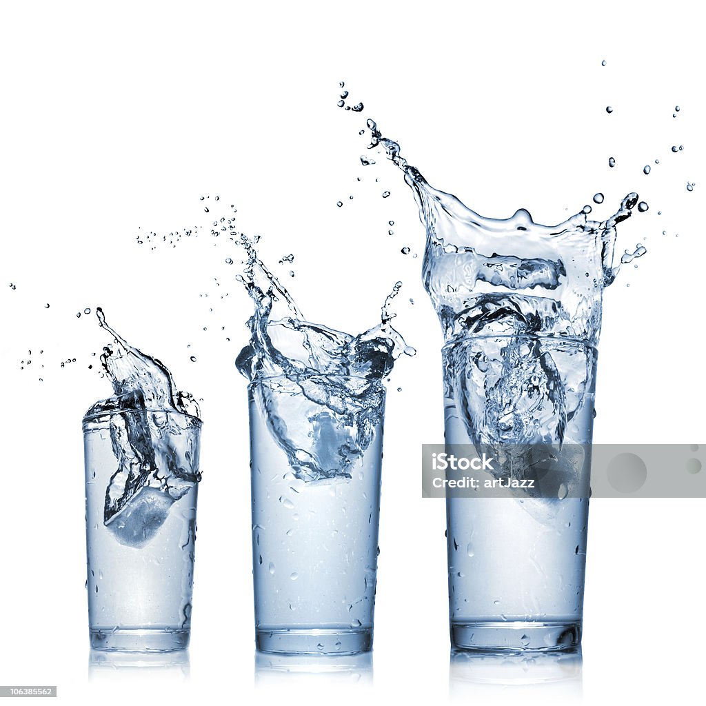 Splash of water in glass  Blue Stock Photo