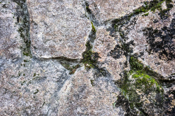 Fragment of a wall from a chipped old stone