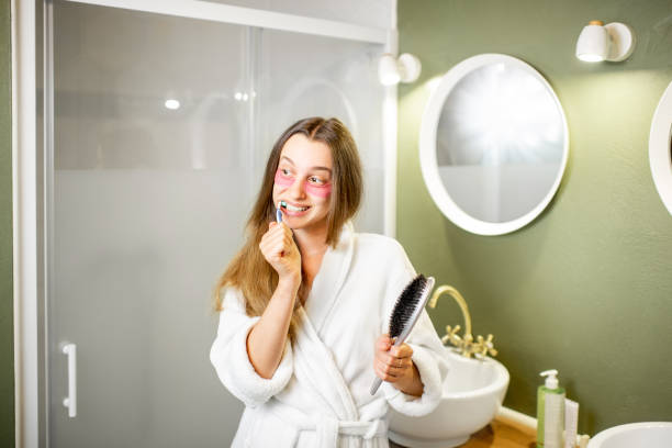 istock Woman brushhing teeth in the bathroom 1063861372