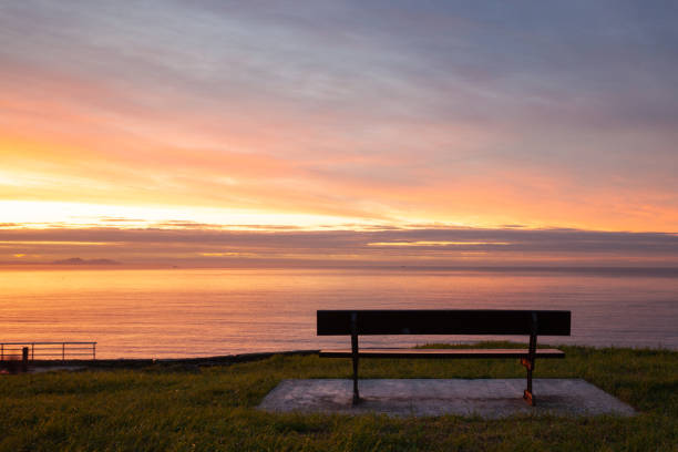 istock Sunset beach and bench. Perfect viewpoint to ocean 1063861378