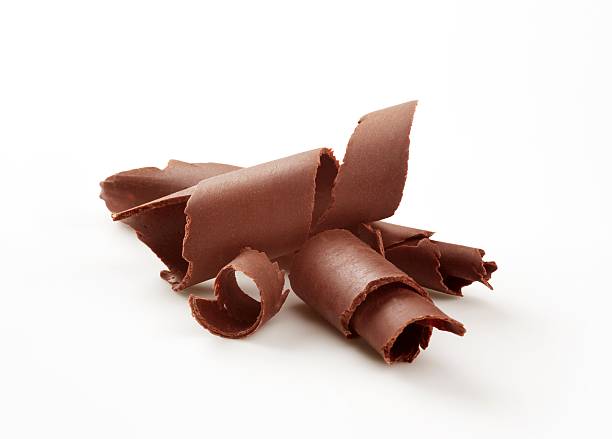 istock Pieces of chocolate curls on white background 106386188