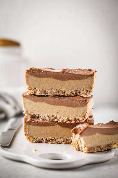 istock Raw vegan chocolate cashew cake on a light background. 1063862210