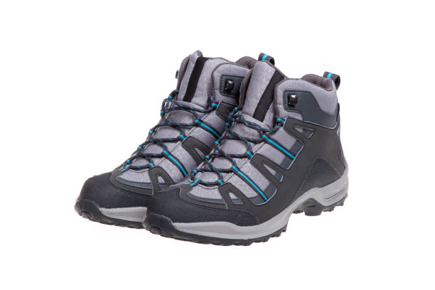 istock Man's winter mountain boots, isolated on white 1063862474