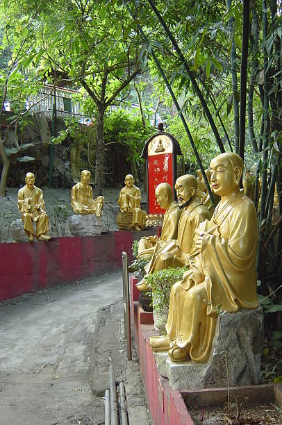 Closeup of the men's and women's wooden faces