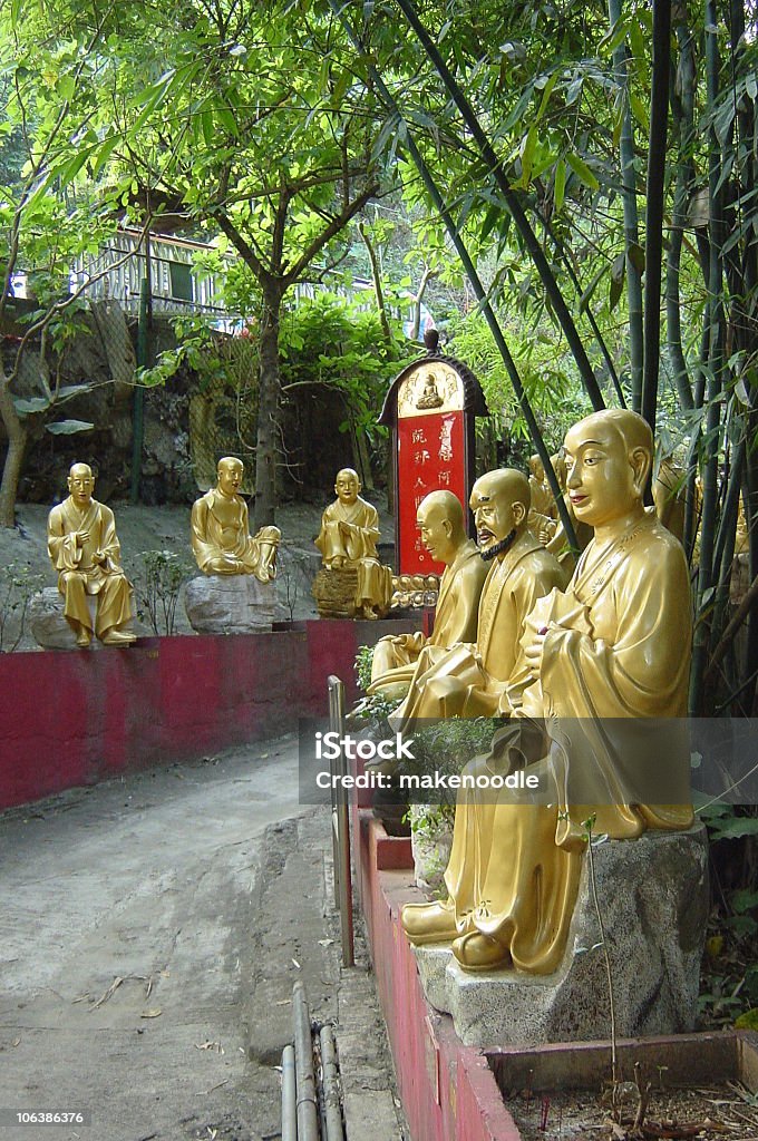 Gold Hundred Buddha Statues  Day Stock Photo