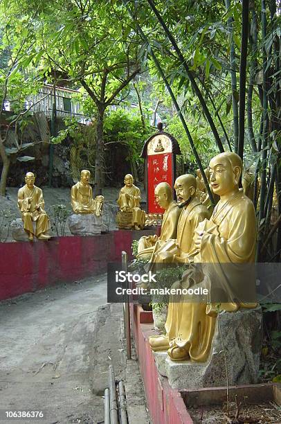 Gold Hundred Buddha Statues Stock Photo - Download Image Now - Day, Asia, Bamboo - Material