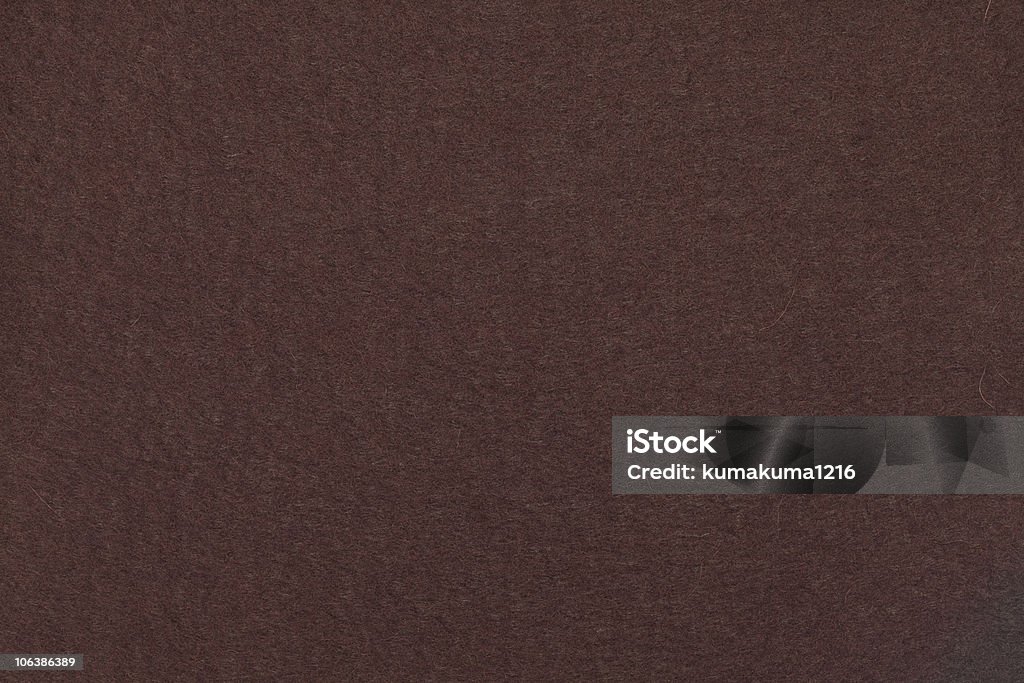 Background of dark brown felt Backgrounds Stock Photo