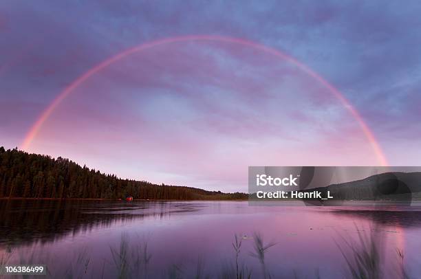 Rainbow Over A Swedish Lake Stock Photo - Download Image Now - Rainbow, Beauty In Nature, Cloud - Sky