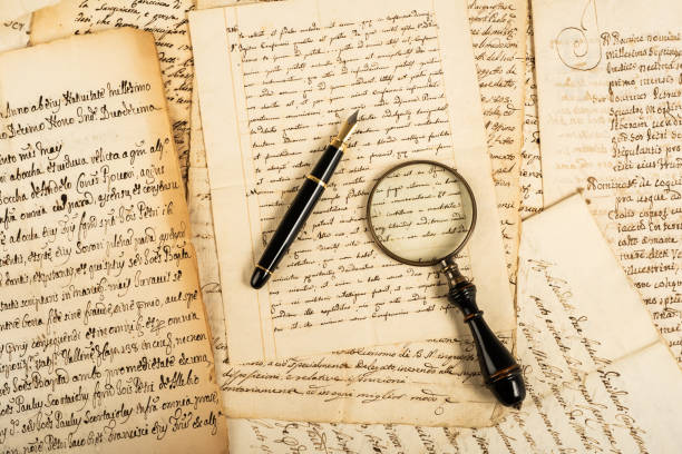 istock Fountain pen and magnifying glass 1063867096