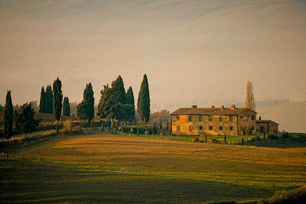 istock Tuscan Farmhouse at sunset 106386789