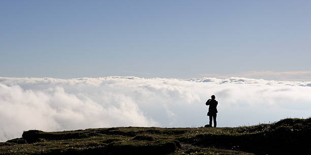 istock Girl taking a photo of clouds 106387329