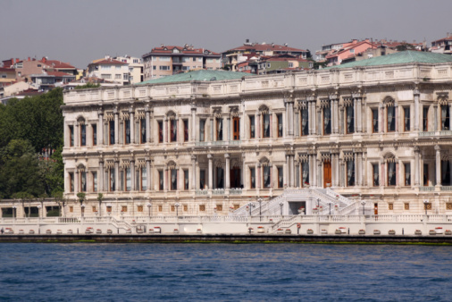 Çırağan Palace, a former Ottoman palace, is located on the European shore of the Bosphorus between Beşiktaş and Ortaköy. Built by Sultan Abdülâziz, it was designed by Armenian palace architect Nigoğayos Balyan and constructed by his sons Sarkis and Hagop Balyan between 1863-67.