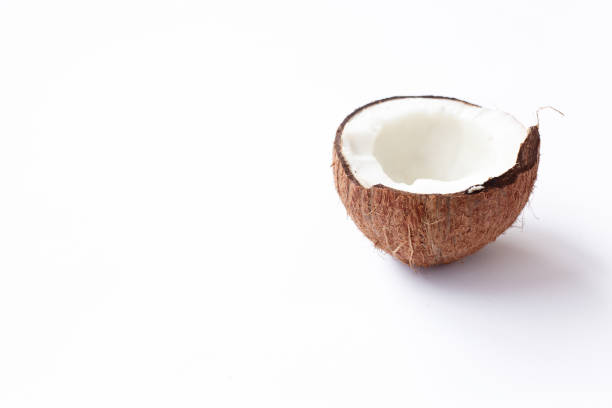 istock Half of coconut closeup on a white background 1063874652