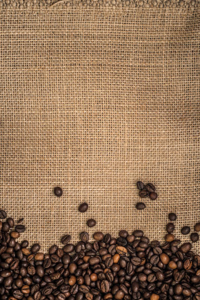 fond de grains de café - burlap bag canvas textile photos et images de collection
