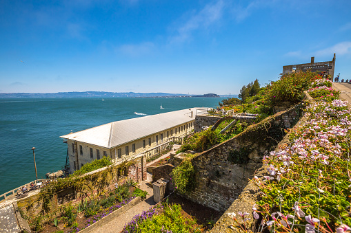 San Francisco, California, United States - August 14, 2016: aerial view of prison garden in Alcatraz prison for inmates recreation and open air work. Blue sky in summer day.