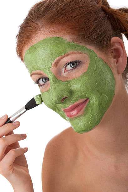Body care Serie-Junge Frau mit grünen Gesichtsmaske – Foto
