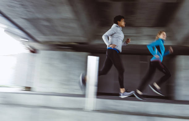 istock Two Female Athlete Running, Blurred Motion 1063897510