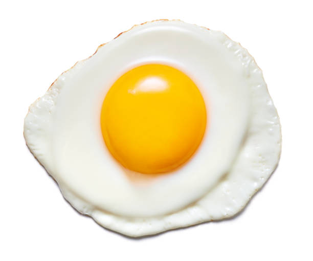 fried egg isolated single fried chicken egg isolated on white background egg yolk on white stock pictures, royalty-free photos & images